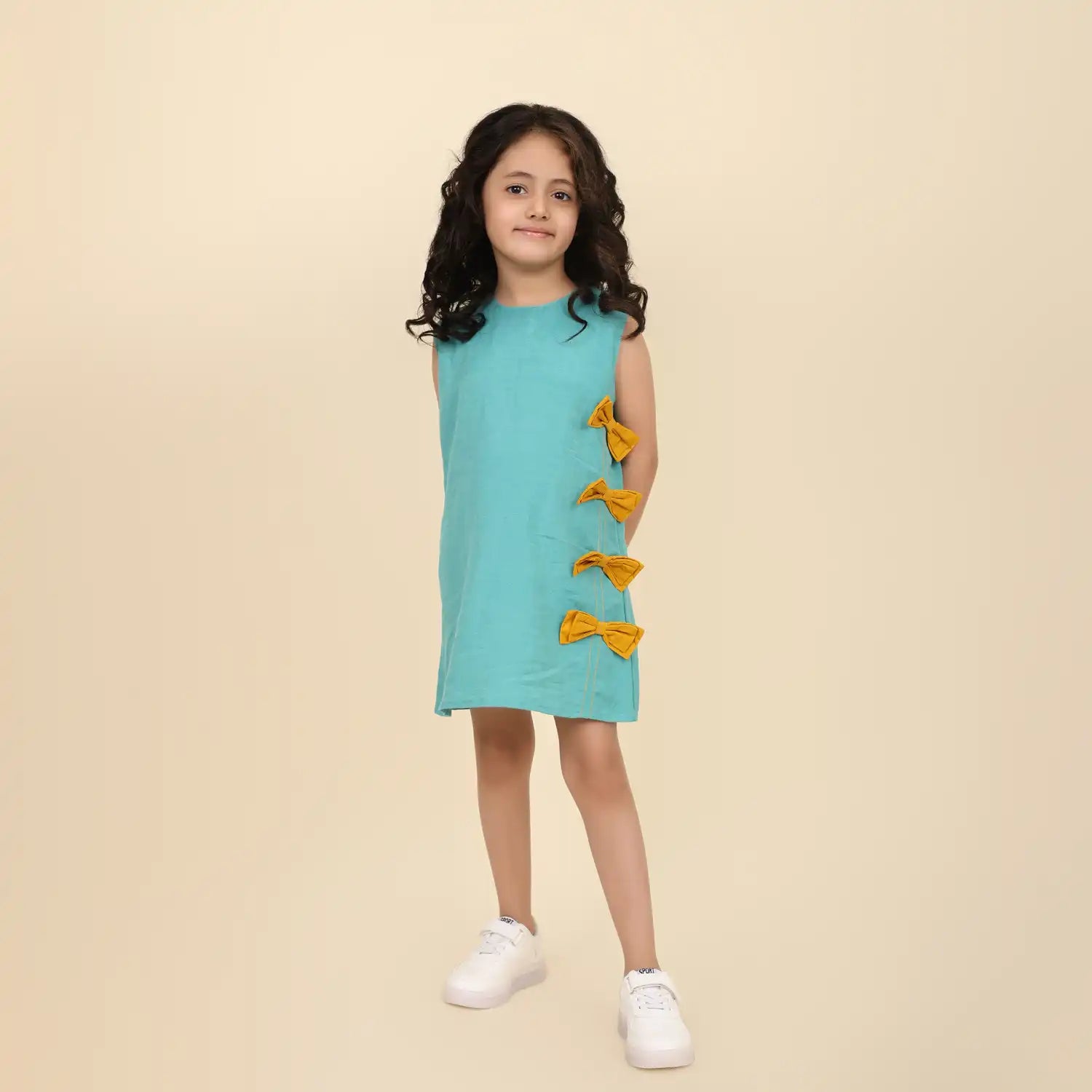 Sleeveless Teel blue linen Tunic with Mustard Bow Detail