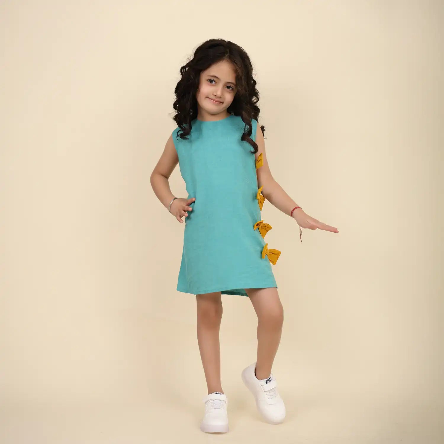 Sleeveless Teel blue linen Tunic with Mustard Bow Detail