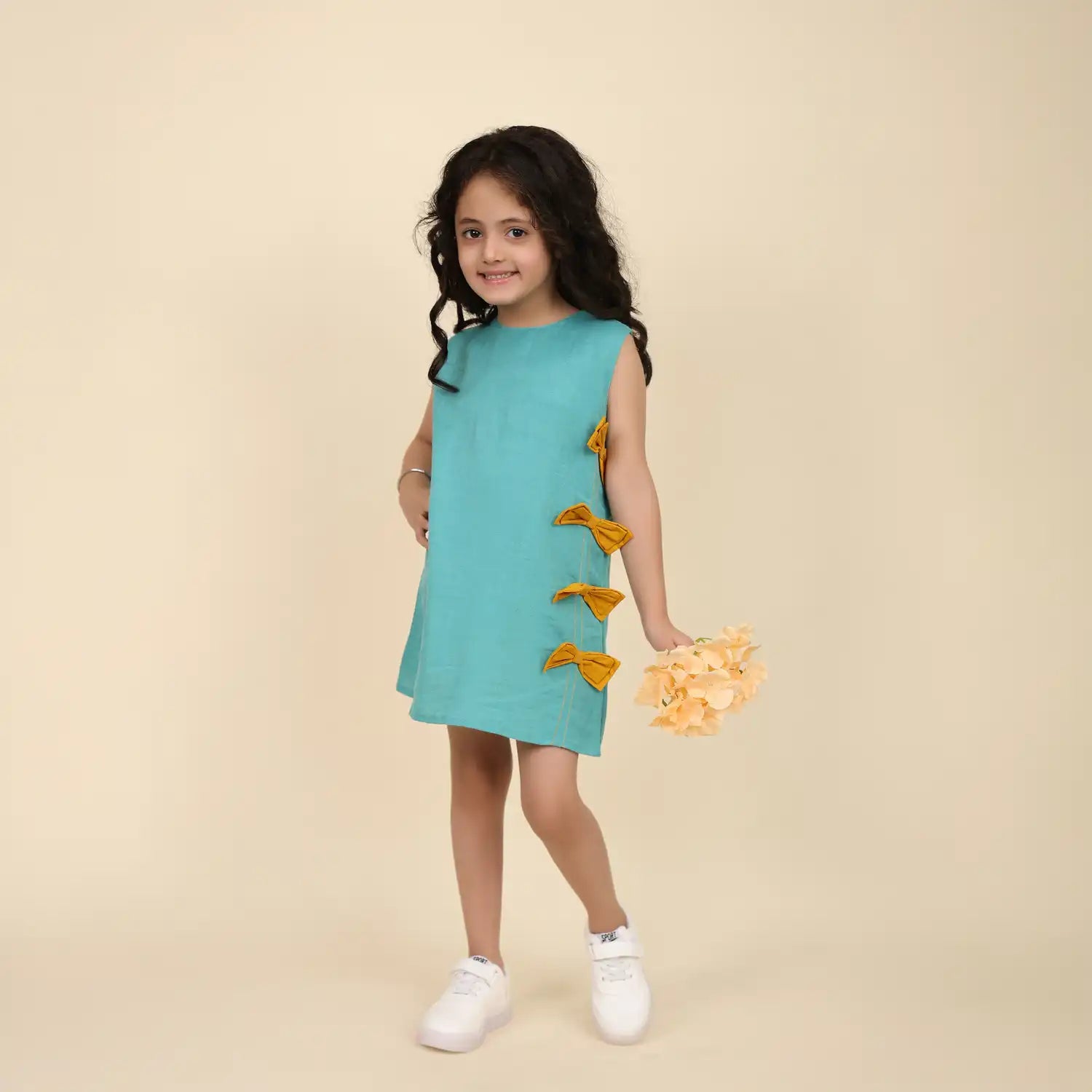 Sleeveless Teel blue linen Tunic with Mustard Bow Detail