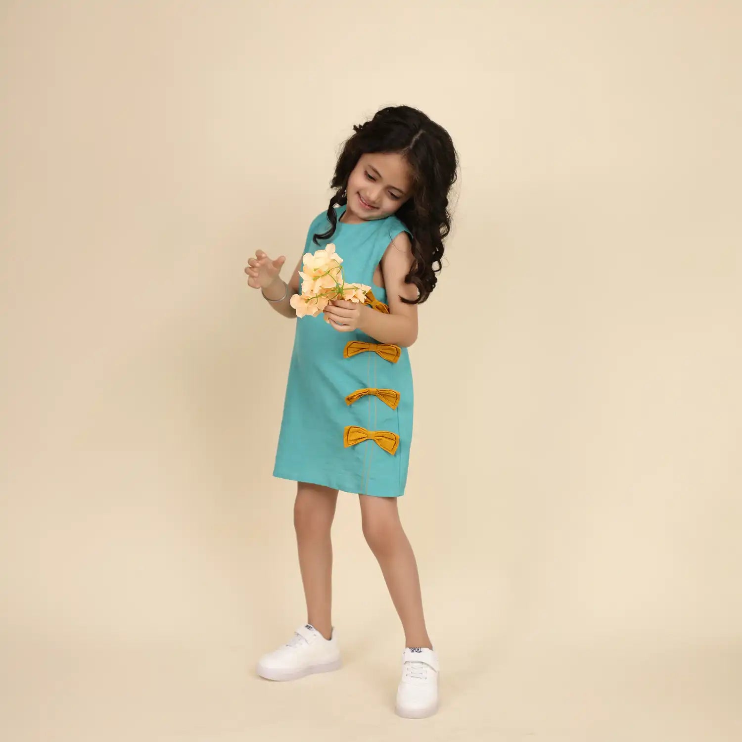 Sleeveless Teel blue linen Tunic with Mustard Bow Detail